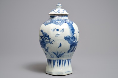 A Chinese blue and white covered vase with birds among flowers, Transitional period