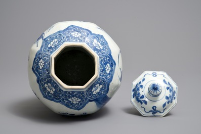 A Chinese blue and white covered vase with birds among flowers, Transitional period