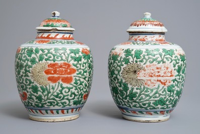 A pair of Chinese wucai jars and covers with floral design, Transitional period