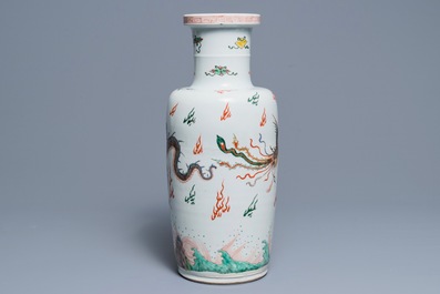 A Chinese famille verte inscribed 'dragon and phoenix' rouleau vase, Kangxi mark and of the period