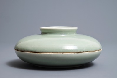 A round Chinese celadon compartmented bowl and cover, Qianlong mark, 19th C.