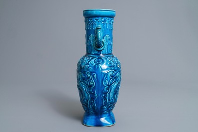 Een Chinese monochrome turquoise vaas met reli&euml;fdecor, 18/19e eeuw