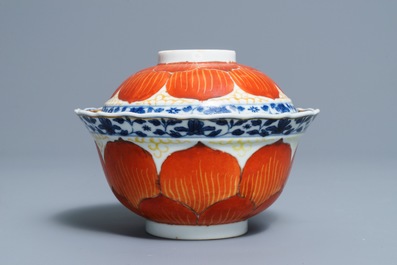 A Chinese blue, white and iron red bowl and cover on stand, Qianlong/Jiaqing