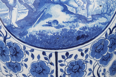 Une paire de grands vases couverts en fa&iuml;ence de Bruxelles en bleu et blanc, sign&eacute;s et dat&eacute;s 1861