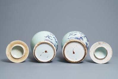 A pair of Chinese blue, white and underglaze red celadon ground vases and covers, 19/20th C.