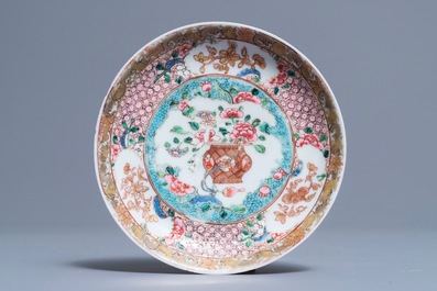 A fine Chinese famille rose 'ruby back' cup and saucer, Yongzheng