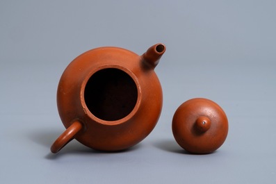 A Chinese Yixing stoneware teapot and cover, impressed and incised mark, 18/19th C.