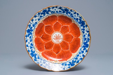 A Chinese blue, white and iron red bowl and cover on stand, Qianlong/Jiaqing