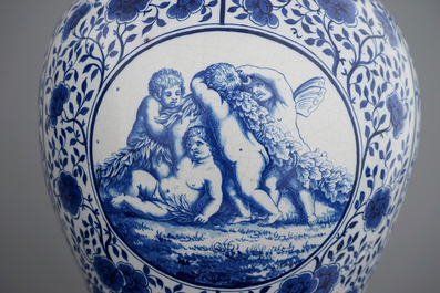 Une paire de grands vases couverts en fa&iuml;ence de Bruxelles en bleu et blanc, sign&eacute;s et dat&eacute;s 1861