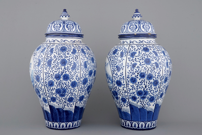 Une paire de grands vases couverts en fa&iuml;ence de Bruxelles en bleu et blanc, sign&eacute;s et dat&eacute;s 1861