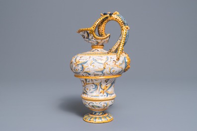 An Italian maiolica jug with grotesques, Caltagirone or Deruta, 17th C.