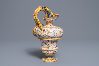 An Italian maiolica jug with grotesques, Caltagirone or Deruta, 17th C.