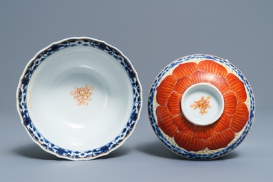 A Chinese blue, white and iron red bowl and cover on stand, Qianlong/Jiaqing