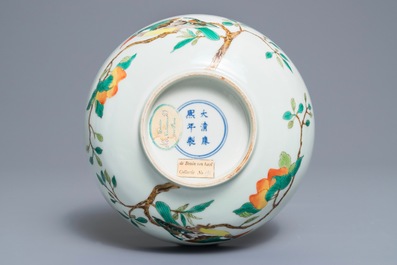 A Chinese famille verte 'birds on peach branches' bowl, Kangxi mark, 19th C.