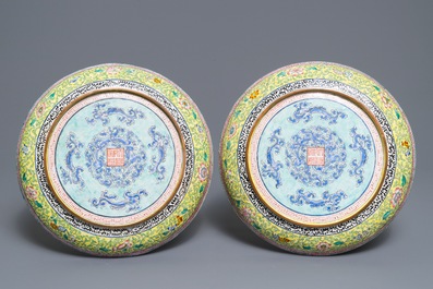 A pair of Chinese Canton enamel plates with ladies and children, Qianlong mark, 19th C.