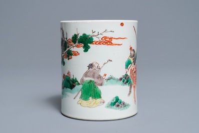 A Chinese famille verte brush pot on wooden stand, Kangxi