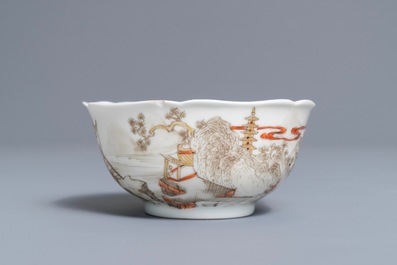 A Chinese gilt grisaille and iron red cup with two saucers, Yongzheng