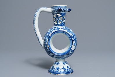 A large Dutch Delft blue and white ring-form puzzle jug, 1st quarter 18th C.