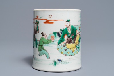 A Chinese famille verte brush pot on wooden stand, Kangxi