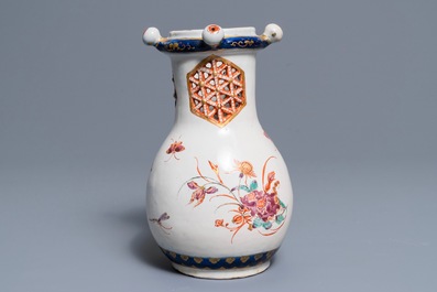 A polychrome petit feu and gilded Dutch Delft puzzle jug with insects and flowers, 1st half 18th C.