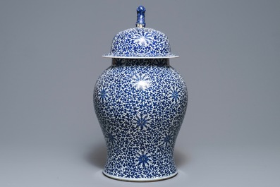 A large Chinese blue and white 'lotus scroll' vase and cover, 19th C.