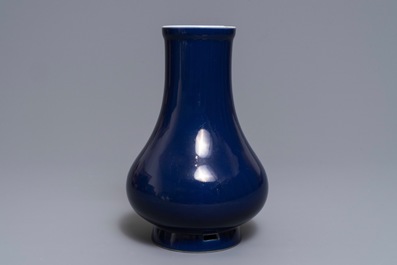 A Chinese monochrome 'sacrifical blue' pear-shaped vase, Yongzheng mark and of the period