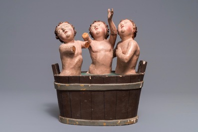 Un groupe en bois sculpt&eacute; et polychrom&eacute; 'Les enfants de Saint-Nicolas', 18&egrave;me
