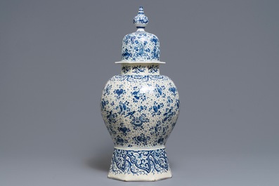 A large Dutch Delft blue and white vase and cover, early 18th C.
