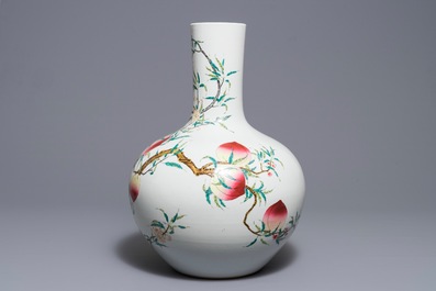 A Chinese famille rose &lsquo;nine peaches&rsquo; tianqiu ping vase, Qianlong mark, 20th C.