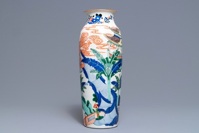 A Chinese wucai rouleau vase, 19th C.