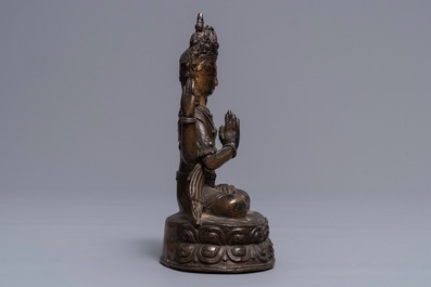 A Sino-Tibetan gilt bronze figure of the four-armed Avalokiteshvara, 18th C.