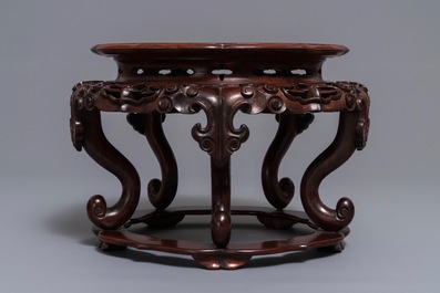 A Chinese rootwood-top carved wood stand, 19/20th C.