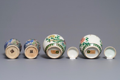 A pair of Chinese famille verte vases and a pair of covered jars, 19th C.