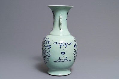 A Chinese blue and white on celadon ground 'buddhist emblems' vase, Qianlong mark and of the period