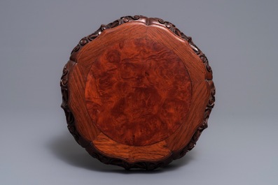 A Chinese rootwood-top carved wood stand, 19/20th C.