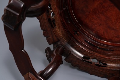 A Chinese rootwood-top carved wood stand, 19/20th C.