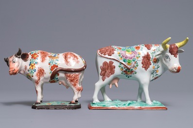 Two polychrome Dutch Delft petit feu cows on bases, 18th C.