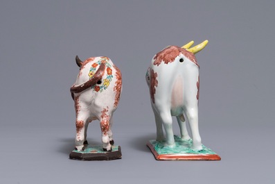 Two polychrome Dutch Delft petit feu cows on bases, 18th C.