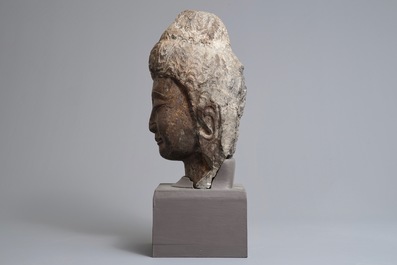 A Chinese carved limestone head of Buddha, Northern Wei (386-535)
