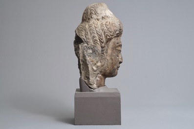 A Chinese carved limestone head of Buddha, Northern Wei (386-535)