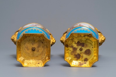 A pair of S&egrave;vres-style 'bleu c&eacute;leste' ormolu-mounted vases and covers, France, 19th C.