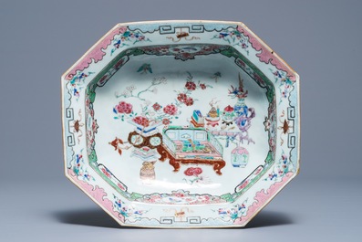 A Chinese famille rose basin and a pair of plates with 'antiquities' design, Qianlong