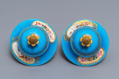 A pair of S&egrave;vres-style 'bleu c&eacute;leste' ormolu-mounted vases and covers, France, 19th C.