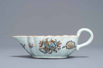 A Chinese famille rose Dutch market armorial plate and sauce boat with the arms of Van Tets, Qianlong