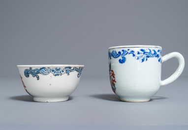 Two Chinese armorial cups and a saucer, Yongzheng