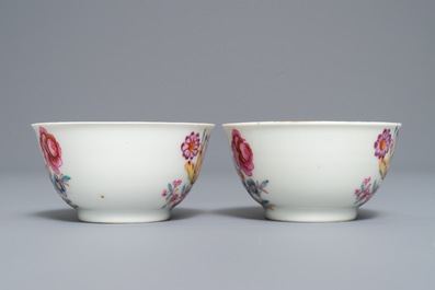 A pair of Chinese famille rose cups and saucers with fine floral design, Qianlong