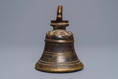 A Sino-Tibetan bronze bell with traces of lacquer and gilding, 17/18th C.
