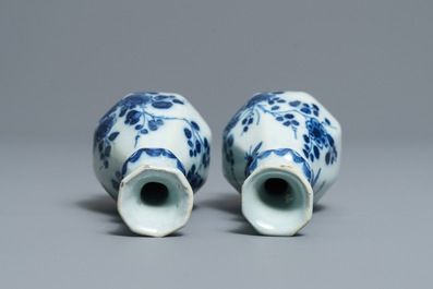 A pair of Dutch Delft blue and white octagonal bottle vases, 17/18th C.