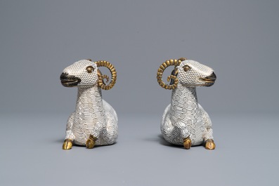 A pair of Chinese cloisonn&eacute; and gilt bronze models of rams, Qianlong