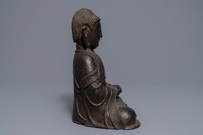A Chinese gilt-lacquered bronze figure of Amithaba Buddha, Ming